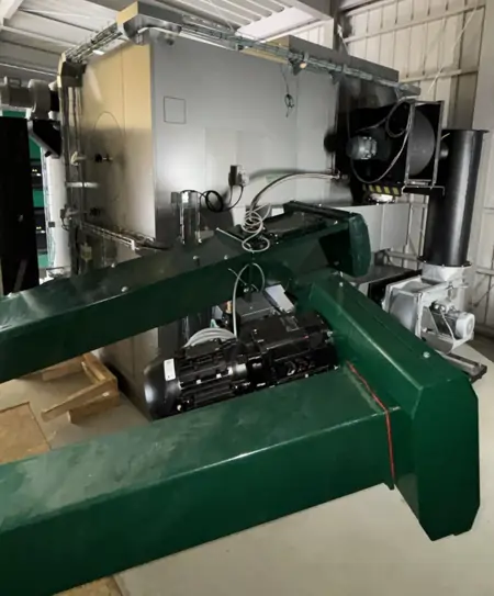 The biomass fuel is fed to the KWB Powerfire2 boiler with dedicated fuel augers.